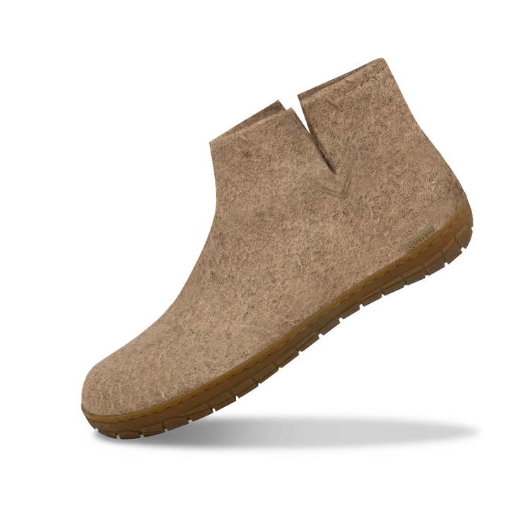 The honey rubber boot sand