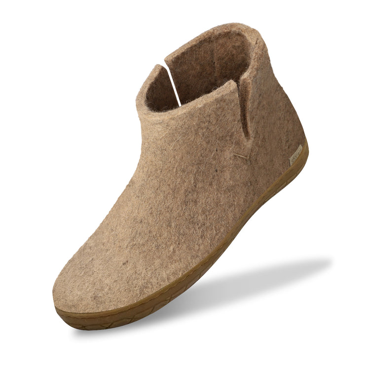 The honey rubber boot sand