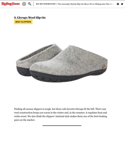 A pair of Grey glerups slip-ons with black rubber soles is displayed against a light background.